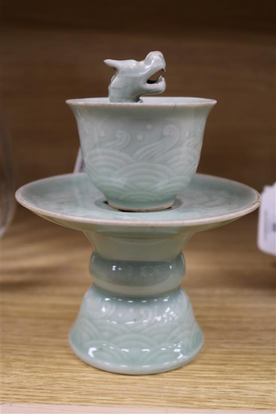 A 19th century Chinese celadon cup and stand